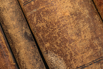 a stack of old vintage books in a library