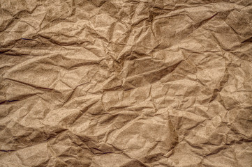Obraz premium Texture of beige crumpled paper. Vintage background 
