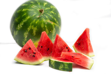 watermelon on white background.  Ripe watermelon - a symbol of summer. Pieces of watermelon