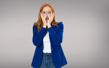 Female headache isolated on gray background - suffering business woman, hard work in company