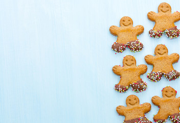 Gingerbread man on blue background.