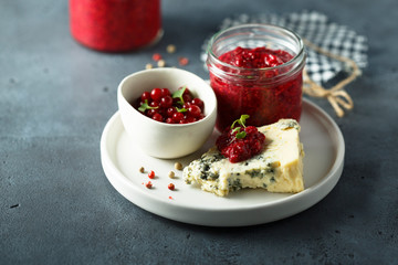 Homemade berry chutney with blue cheese