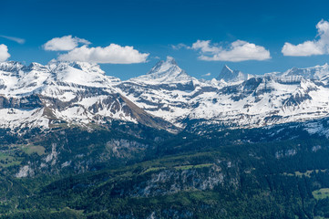 Wetterhorn, Schreckhorn and Finsteraarhorn on a beautiful day with some clouds