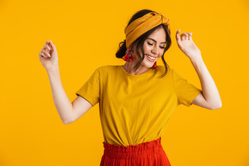 Portrait of a pretty young girl casualy dressed standing isolated