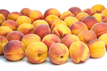 apricot yellow red sweet juicy fruit on a white background