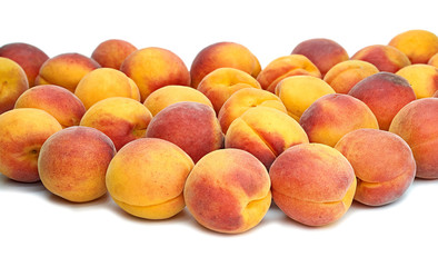 apricot yellow red sweet juicy fruit on a white background