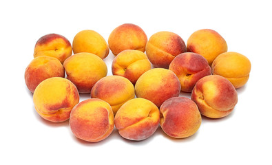 apricot yellow red sweet juicy fruit on a white background