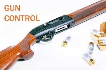 Reform gun control concept. Rifle on the table.