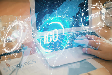 Blockchain theme hologram with man working on computer on background. Concept of crypto chain....