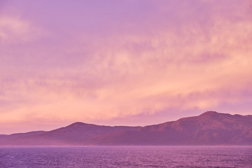 Sunrise seen from the cruise ship near Stewart Island (Rakiura), New Zealand