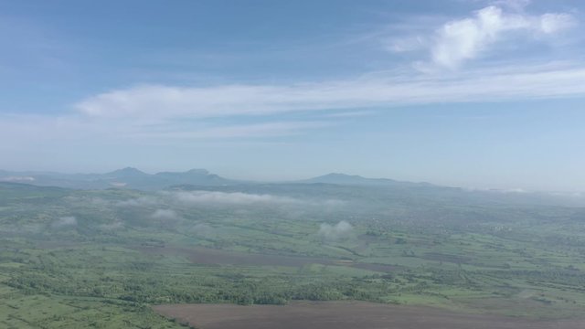 Foggy morning with Stol Deli Jovan and Veliki Krs mountains in Eastern Serbia 4K aerial footage