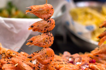Grilled shrimp skewers. Shrimps prawns brochette kebab. Barbecue shrimps