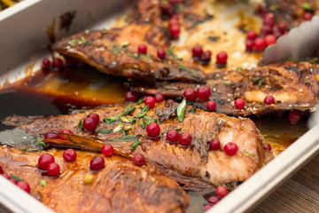 Grilled fish with spices and berries