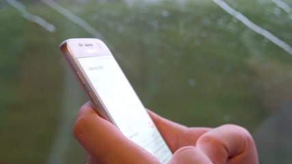 Woman using the phone in the train in 4k slow motion 60fps