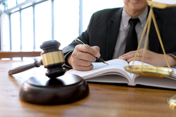 Judge or lawyer have gavel with  balance work in office