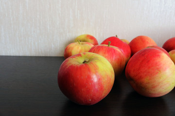 Ripe red apples on a table.  Place for your text.