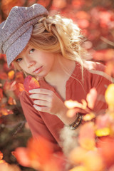 Teen girl in the fall. Beautiful girl outdoors in autumn. 