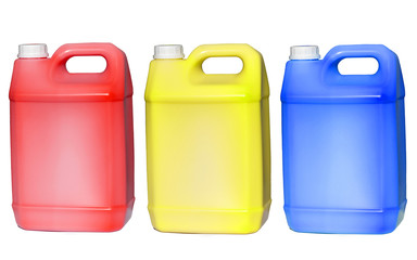 Red, yellow, blue color tank or oil bottle isolated on white background. Canister of industrial oil.