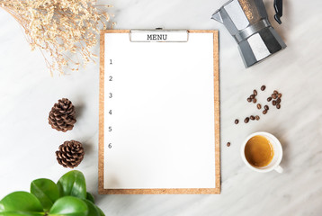 Menu paper mockup with coffee cup in restaurant for input design list text.