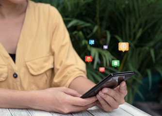 Young woman using social media network on smartphone. technology connection and communication concept.