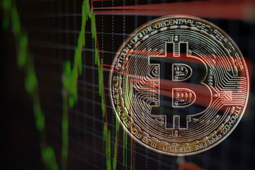 Binary options chart, trading statistics. Bitcoin and cryptocurrency investing. Concept with bitcoins and candle graph on background.