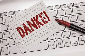 Text sign showing Danke. Conceptual photo used as informal way of saying thank you in German...