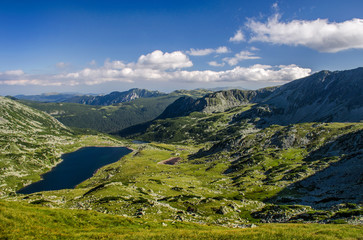 Fototapeta na wymiar Mountain landscape and glacial Bucura lake in Retezat National Park, Carpathian Mountains, Romania