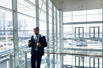 Fototapeta premium Businessman using smartphone at work