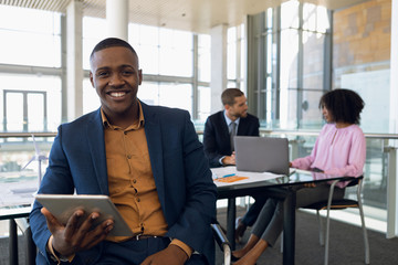 Diverse young business people working in modern office