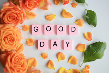 The word Good Day from wooden letters.