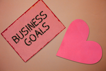 Conceptual hand writing showing Business Goals. Business photo text Expectation to accomplish over...