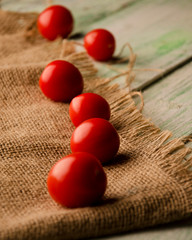 tomatoes on wooden background