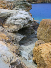 Background texture of rough cliff rock wall