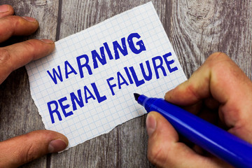 Handwriting text writing Warning Renal Failure. Concept meaning stop Filtering Excess Waste Acute...