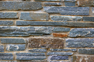 Naklejka premium Stone wall texture background, facade