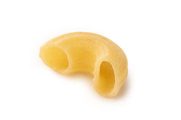 Elbow macaroni - shape of pasta on white background isolated