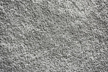 Cement plastered stone wall. Texture, design, background.