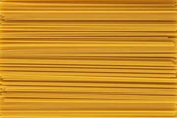 Raw dry spaghetti straight as background