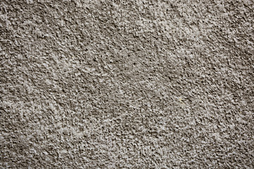 Cement plastered stone wall. Texture, design, background.