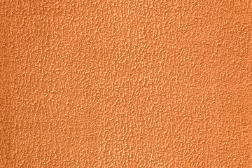 Orange plastered wall  background, texture