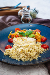 Baked salmon, vegetables and sorrel sauce accompanied oatmeal, lentil and cooked rice