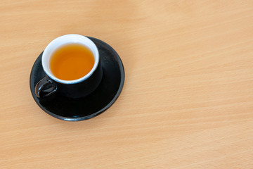 Cup of tea on wooden table
