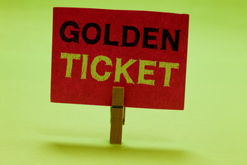 Text sign showing Golden Ticket. Conceptual photo Rain Check Access VIP Passport Box Office Seat Event Clothespin holding red paper important communicating messages ideas