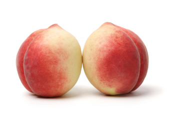 ripe peach on white background 