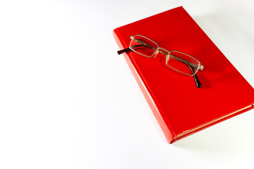 Red book and glasses