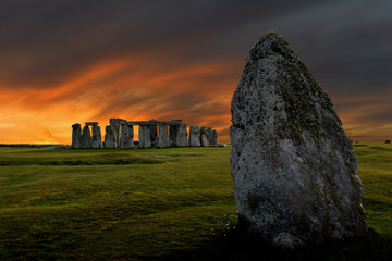 Stonehenge an ancient prehistoric stone monument from Bronze and Neolithic ages, constructed as a ring near Salisbury with dramatic sky, Wiltshire in England, United Kingdom  - obrazy, fototapety, plakaty