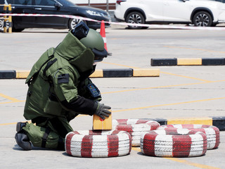Bomb Disposal Expert in Bomb suit for Explosive ordnance disposal
