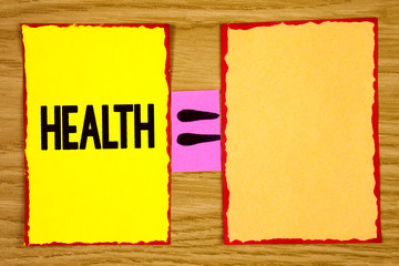 Conceptual hand writing showing Health. Business photo text State of being free from Illness Injuries Mental Physical condition written Sticky Note Paper wooden background Equation Space.