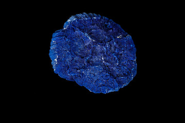 Macro mineral stone Azurite in siltstone against black background