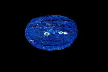 Macro mineral stone Azurite in siltstone against black background